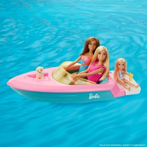 Barbie doll, boat and puppy